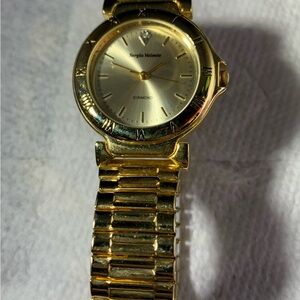 Sergio Valente Gold-Tone Bracelet Watch Diamond Dial Stretch Band.